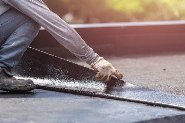 Professional Basement Waterproofing technician working in Rochelle, VA